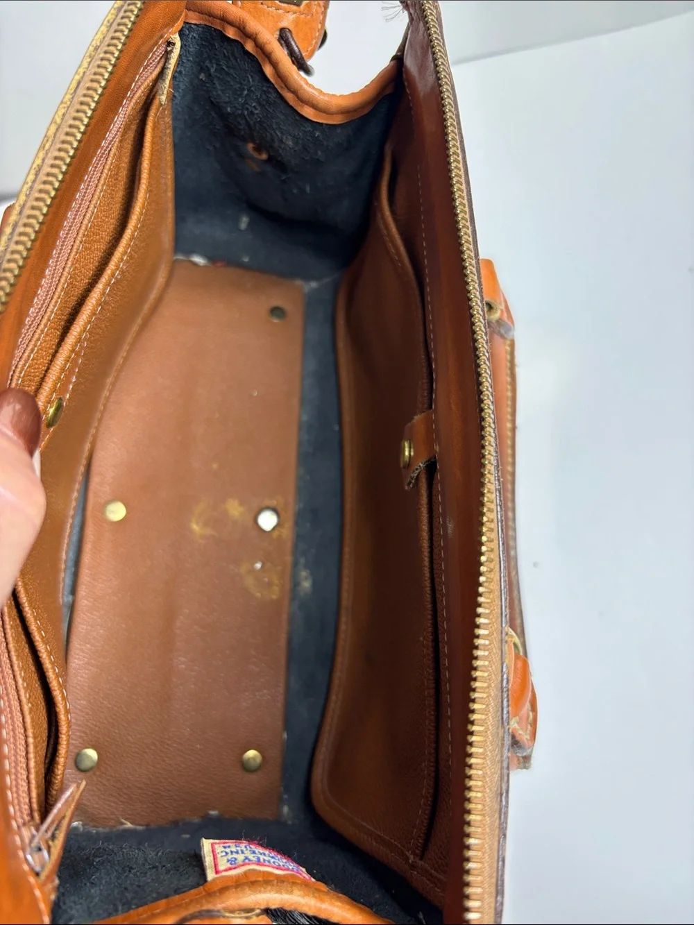 Dooney & Bourke Black Pebbled Leather Satchel with Tan Trim
